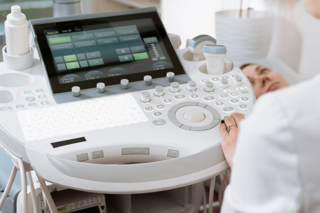Ultrasound imaging scene illustrating how to check which printer paper a used ultrasound system needs