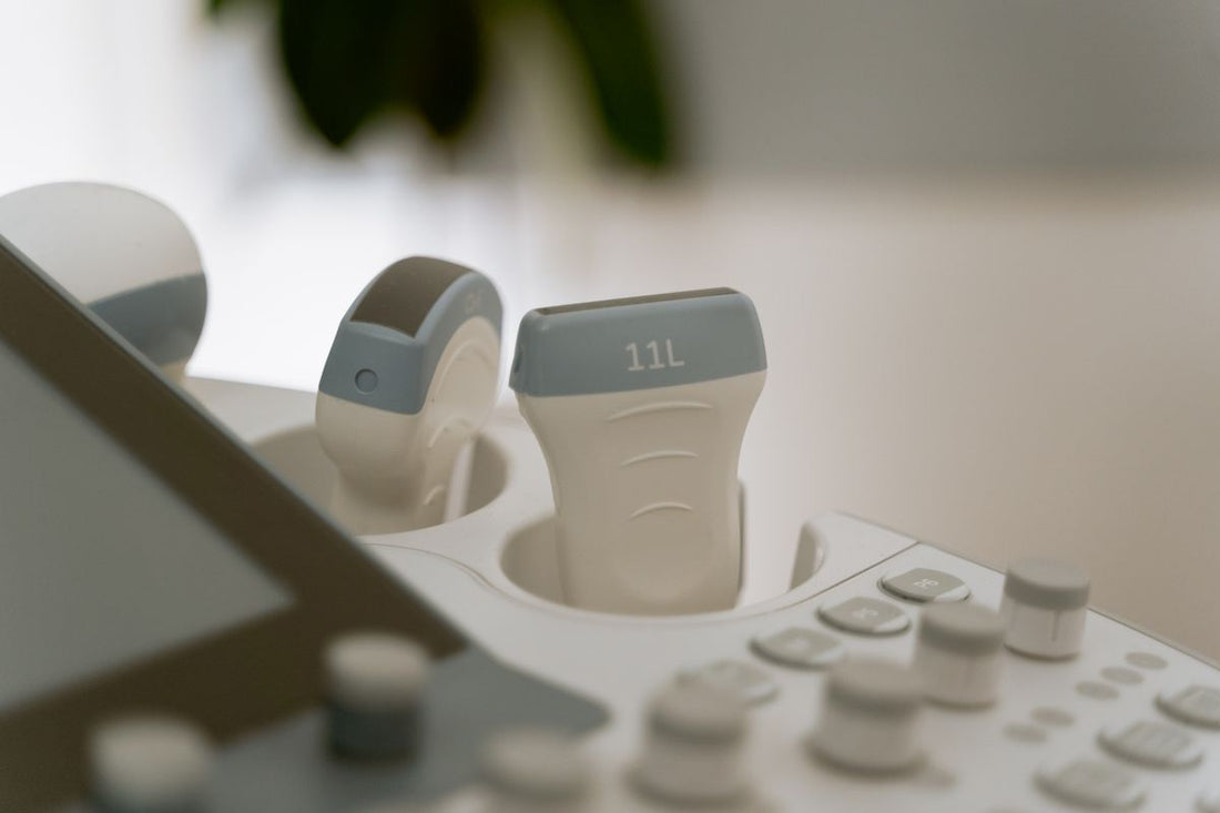 Ultrasound equipment in a clinic, representing vascular lab ultrasound printing